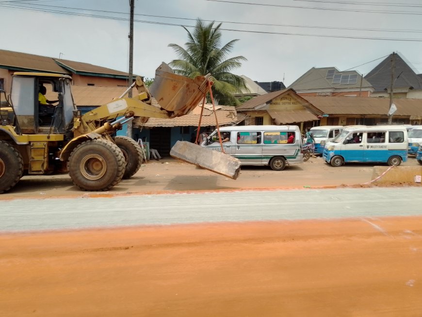 Buses Patiently Waiting Along The Azaraegbelu Axis Of The Owerri-Umuahia Road, For The Road Dividers To Be Moved